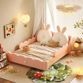 Solid wood kids bed featuring a rabbit cartoon cushion and protective guardrail for safety